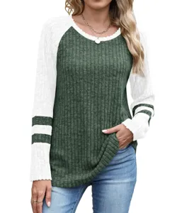 Long sleeve colorblock ribbed knit sweater with classic crewneck and striped sleeve details.