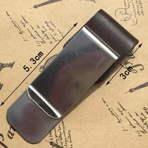 Metal notebook pen clip detail view, vintage stationery accessory, sturdy metal design for journal.