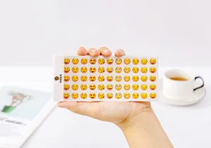 Mini emoji sticker sheet featuring various cute facial expressions for phone and journal decor.