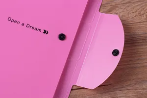 Close-up detail view of pink multi-layer PP expanding accordion file folder with snap button.