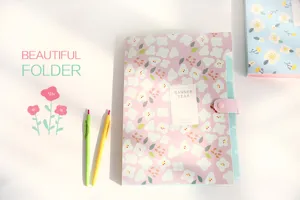 Floral accordion folder with snap closure, cute pink document organizer for school and office.