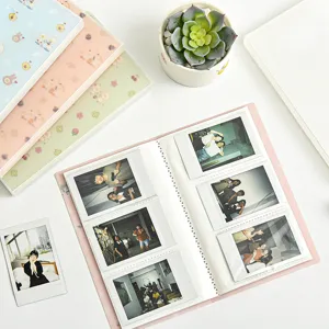 Cute cartoon card storage book with large capacity, ideal for polaroids and photo cards.