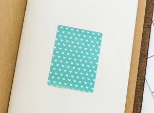 Closeup detail of cyan cute heart sticker for diy photo album and bullet journal decoration