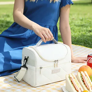 White quilted insulated lunch bag with shoulder strap, perfect for work, school and picnic.