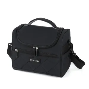 Black insulated lunch bag with quilted design, top handle, and adjustable shoulder strap.