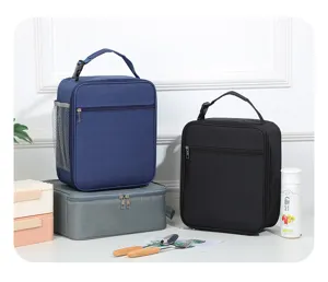 Insulated lunch bags in blue and black showing large capacity for daily meal storage.