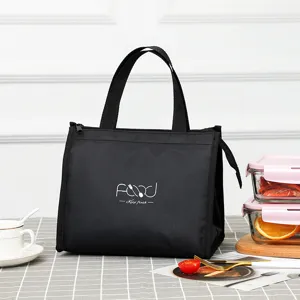 Black insulated lunch bag for students and office workers, durable waterproof bento bag.