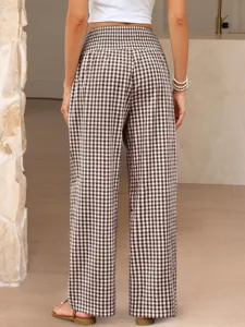 Back view of brown and white gingham high waist wide leg pants showing relaxed fit style.