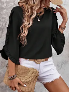 Black ruffle 3/4 sleeve blouse detail, featuring round neck and elegant casual design for women.
