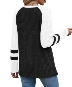 Back detail of women's color-block raglan sleeve sweater with striped sleeves and crew neck.