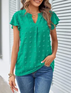 Green swiss dot V-neck short sleeve blouse detail view, elegant summer chiffon top.