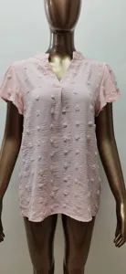 Pink V-neck short sleeve chiffon top with cute pom-pom swiss dot texture details.