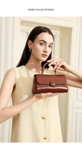 Elegant brown leather handbag for women, featuring a chic structured design and top handle.