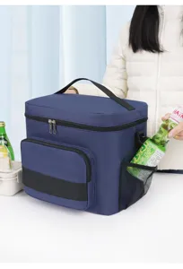 Insulated lunch bag with large capacity, oxford cloth design, side pockets, and durable handles.