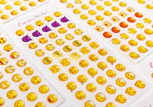 Emoji sticker detail showing various mini cute expressions for phone and journal decoration