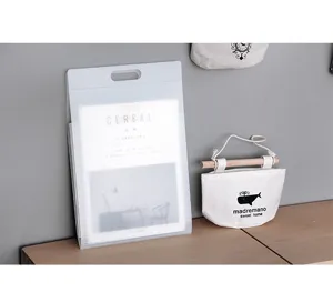 Translucent frosted A4 file bag detail, portable PP document folder with handle design.