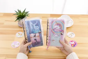 Transparent loose-leaf planner notebook set with cute deer and unicorn covers for daily journaling.