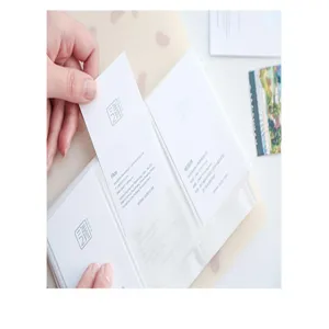 Detailed view of the clear card binder showing transparent pockets and easy card insertion process.