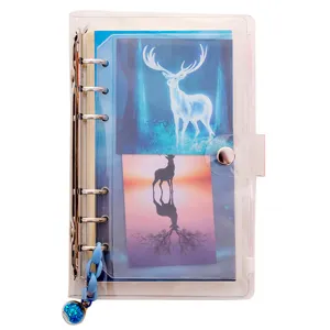 Transparent PVC loose-leaf notebook set with deer illustration inserts and blue chain pendant.
