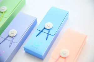 Candy color pencil case with elastic cord button, student plastic stationery storage box.