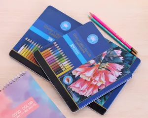 Guanghui water-soluble colored pencils in tin box, 24/36 colors set for student art drawing.