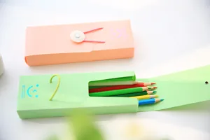 Candy color pencil case with elastic buckle and cute smile design for students stationery storage details