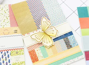 Decorative sticker and scrapbooking material paper set, close-up design details view.