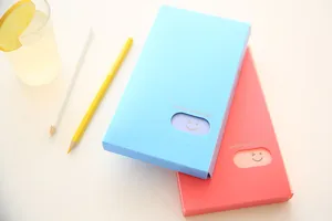 Blue and red PP business card holders featuring a cute smiling face window design.
