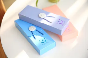 Candy color stationery box student plastic pencil case with cute smiling face closure.