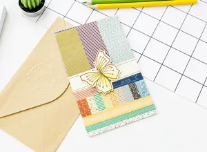 Detail view of the decorative stationery craft card with butterfly design and kraft envelope.