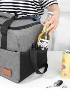 Insulated lunch bag side pocket detail showing bottle storage capacity for daily use.