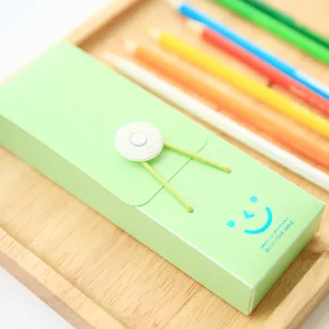 Candy color pencil case with buckle closure and cute smiley face, plastic student stationery storage box.