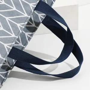 Nordic style gray geometric lunch bag detail, durable fabric material with strong handles.