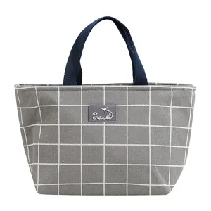 Gray grid canvas insulated lunch tote bag with blue handles for daily office school use.