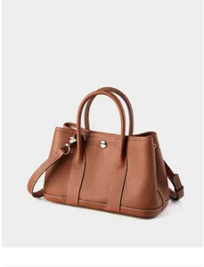 Brown genuine leather handbag for women, vintage top handle shoulder tote bag for daily fashion.