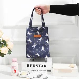 Insulated lunch bag with cute unicorn pattern, portable waterproof tote for work and school.