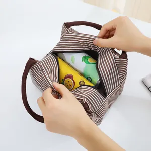 Waterproof Oxford cloth lunch bag with brown striped design, insulated bento handbag for picnic.