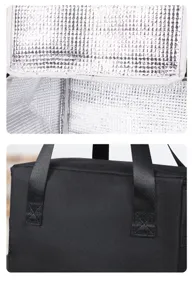 Portable black insulated cooler bag detail, perfect for outdoor picnics and daily lunch boxes.