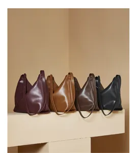 Gedetailleerd overzicht van echt lederen hobo schoudertas, casual dagelijkse stijl, meerkleurig.