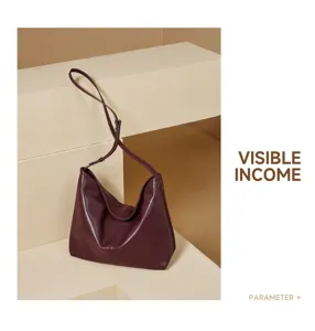 Klassieke bordeauxlederen hobo schoudertas, minimalistisch design voor dagelijks gebruik.