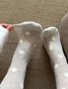 Sheer white polka dot mesh crew socks for women, breathable summer thin style detail view