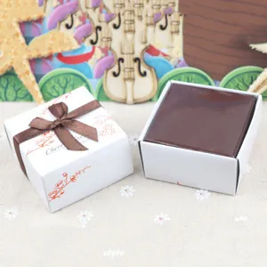Mini wedding favor soap gift box with brown ribbon and elegant floral print design.