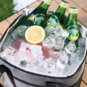 Grey square insulated picnic cooler bag for outdoor camping and portable lunch box storage.