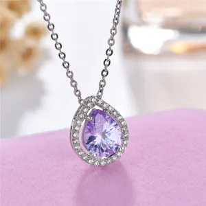 Elegant purple cubic zirconia pear pendant necklace shimmering sterling silver finish jewelry gift.