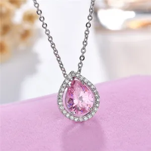 Exquisite pear-shaped pink cubic zirconia halo pendant necklace with silver chain for women.