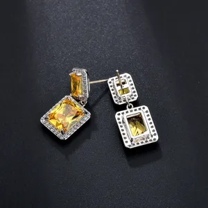 S925 Silber Nadel quadratische gelbe Zirkon Ohrringe Detailansicht, elegantes Design.