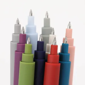 Close-up detail of colorful Morandi gel pens with fine metallic tips and matte finish.
