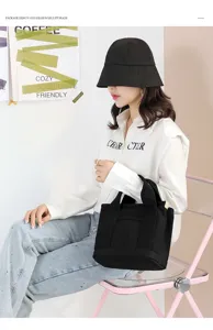 Versatile casual black canvas tote bag for women, large capacity daily handbag and shoulder bag.