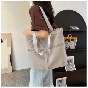 Casual minimalist nylon tote bag for women, stylish large capacity shoulder bag for daily use.