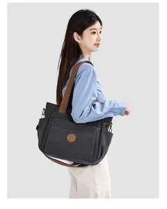 Grand sac a bandouliere en toile pour femme, sac a main de bureau elegant et chic.